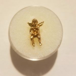 14kt. Solid gold angel charm. 1.1 grams